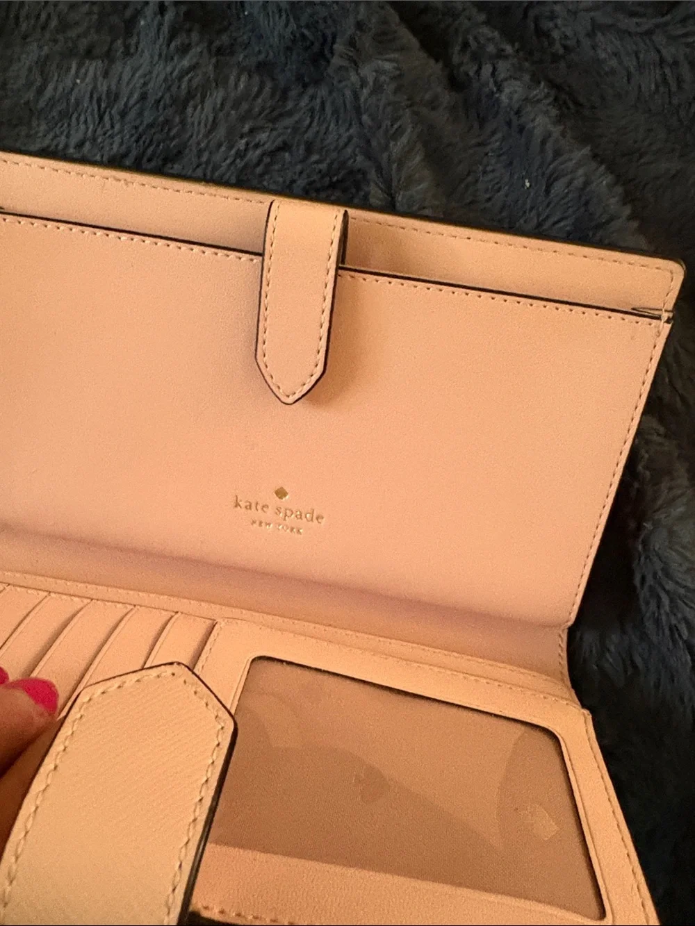 kate spade light pink saffiano leather wristlet with gold logo